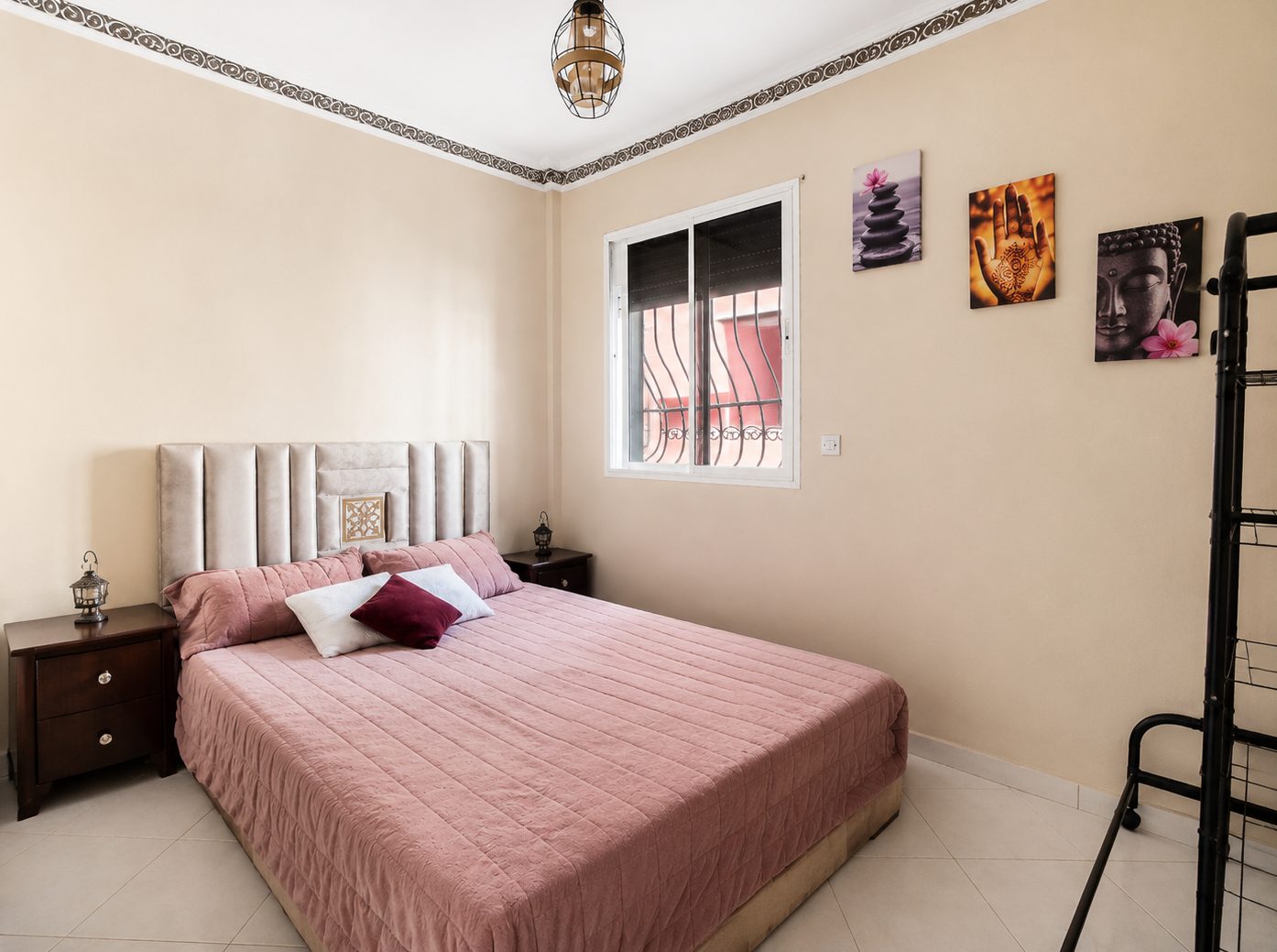 Restful double bedroom in soft rose tones